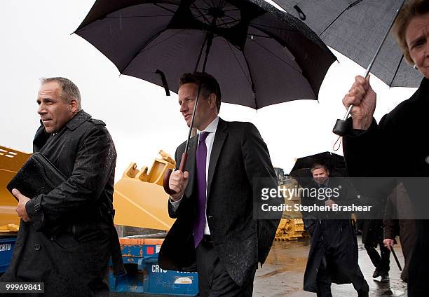 Treasury Secretary Timothy Geithner tours the Port of Tacoma with interim Executive Director John Wolfe and Washington state Gov. Chris Gregoire May...