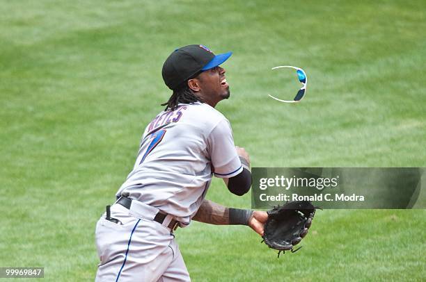 Jose Reyes of the New York Mets throws to first base during a MLB game against the Florida Marlins in Sun Life Stadium on May 16, 2010 in Miami,...