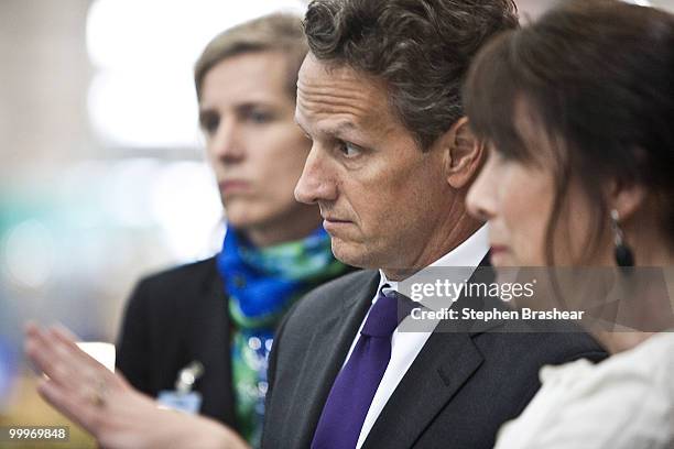 Treasury Secretary Timothy Geithner looks over the production line of the Boeing 737 plant on a tour by Boeing Vice President and General Manager of...