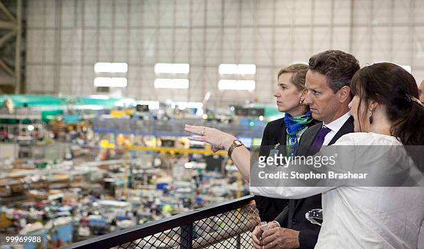 Treasury Secretary Timothy Geithner looks over the production line while getting a tour of the Boeing 737 plant from Boeing Vice President General...