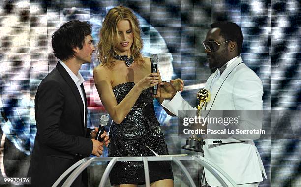 Karolina Kurkova and Ian Somerhalder present Will.i.am an award onstage during the World Music Awards 2010 at the Sporting Club on May 18, 2010 in...