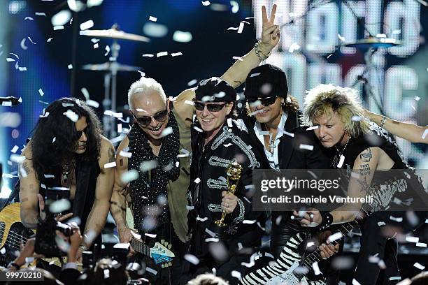 Pawel Maciwoda,Rudolf Schenker, Klaus Meine, Matthias Jabs and James Kottak perform on stage during the World Music Awards 2010 at the Sporting Club...