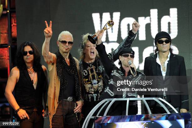 Pawel Maciwoda,Rudolf Schenker, James Kottak, Klaus Meine and Matthias Jabs perform on stage during the World Music Awards 2010 at the Sporting Club...