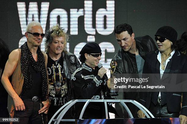 Rudolf Schenker, James Kottak, Klaus Meine and Matthias Jabs of the bank Scorpions collect theiraward onstage from Wladimir Klitschko during the...