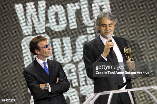 Robin Gibb of the Bee Gees and Andrea Boccelli speak on stage during the World Music Awards 2010 at the Sporting Club on May 18, 2010 in Monte Carlo,...