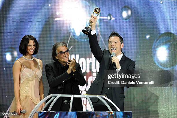 Asia Argento, Designer Roberto Cavalli and Tiziano Ferro speak onstage during the World Music Awards 2010 at the Sporting Club on May 18, 2010 in...