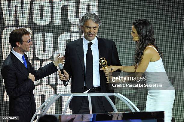 Andrea Bocelli receives his award from Robin Gibb onstage during the World Music Awards 2010 at the Sporting Club on May 18, 2010 in Monte Carlo,...