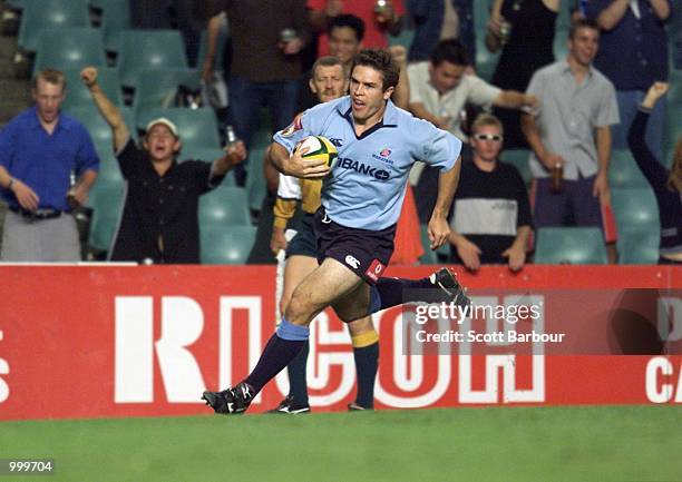 Scott Staniforth crosses for a Waratahs try during the Vodafone Super 12 match between the Waratahs and Northern Bulls played at the Sydney Football...