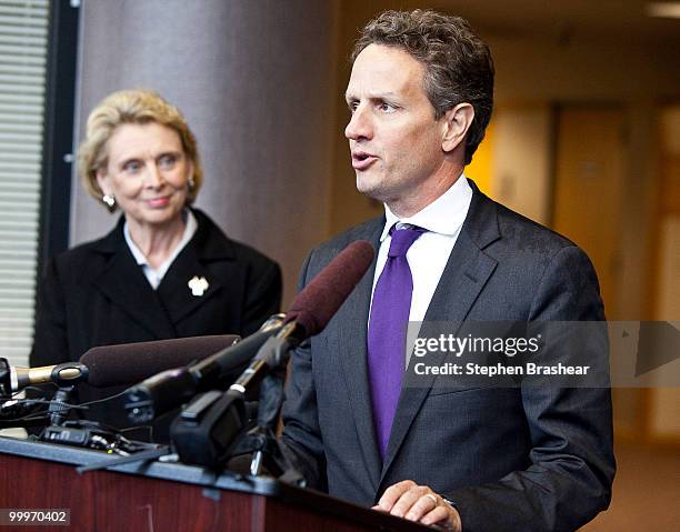 Treasury Secretary Timothy Geithner speaks at a news conference after a tour of the Port of Tacoma May 18, 2010 in Tacoma, Washington. At left is...