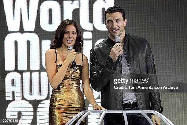Moran Atias and Wladimir Klitschko speak on stage during the World Music Awards 2010 at the Sporting Club on May 18, 2010 in Monte Carlo, Monaco.