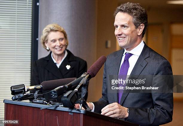Treasury Secretary Timothy Geithner speaks at a news conference after a tour of the Port of Tacoma May 18, 2010 in Tacoma, Washington. At left is...