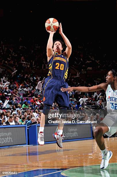Kara Lawson of the Connecticut Sun shoots over Kalana Greene of the New York Liberty during the WNBA preseason game on May 11, 2010 at Madison Square...