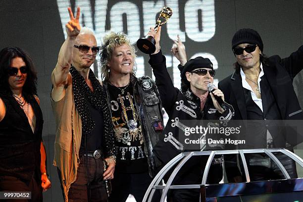 Musicians James Kottak, Matthias Jabs, Klaus Meine, Rudolf Schenker and Pawel Maciwoda of Scorpions accept their Rock Legends award at the World...