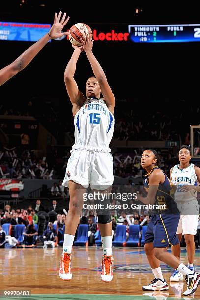 Kia Vaughn of the New York Liberty shoots during the WNBA preseason game against the Connecticut Sun on May 11, 2010 at Madison Square Garden in New...