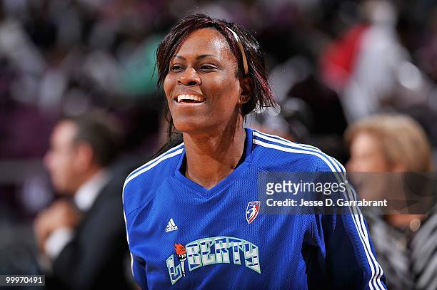 Taj McWilliams-Franklin of the New York Liberty smiles during warm ups before the WNBA preseason game against the Connecticut Sun on May 11, 2010 at...