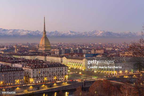 turin, italy: cityscape at sunrise with details of the mole anto - the details imagens e fotografias de stock