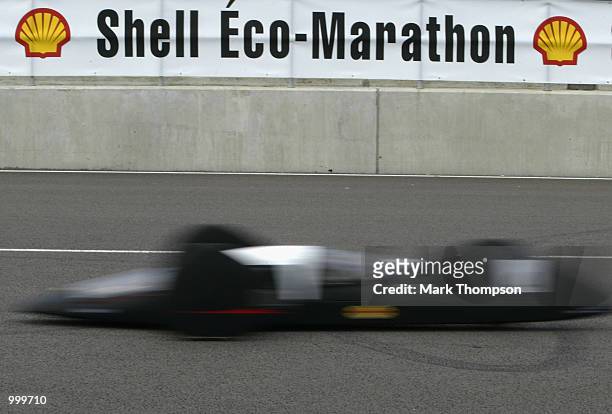 Competitors in action during the Shell Eco Marathon event at the Rockingham Motor Speedway in Corby on July 11, 2002. The cars were competing to beat...