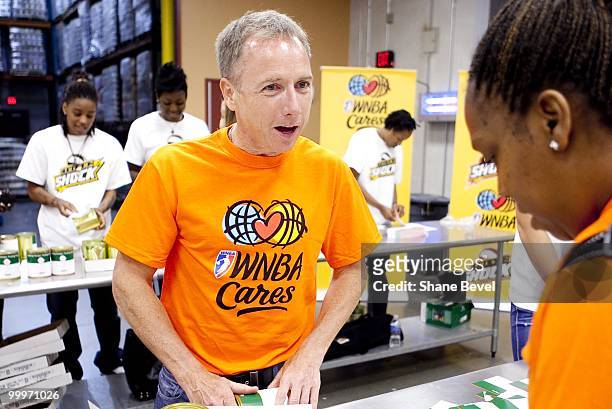 Owner David Box of the Tulsa Shock volunteers at the Community Food Bank of Eastern Oklahoma on May 13, 2010 in Tulsa, Oklahoma. NOTE TO USER: User...