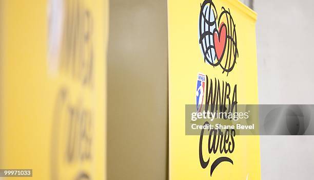 The staff and players from the Tulsa Shock volunteer at the Community Food Bank of Eastern Oklahoma on May 13, 2010 in Tulsa, Oklahoma. NOTE TO USER:...