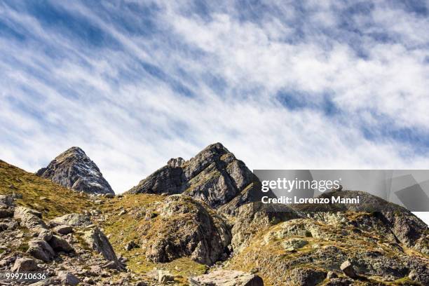 sky and mountains - lorenzo stock pictures, royalty-free photos & images