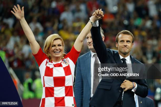 French President Emmanuel Macron and Croatian President Kolinda Grabar-Kitarovic celebrate during the medals ceremony after the Russia 2018 World Cup...