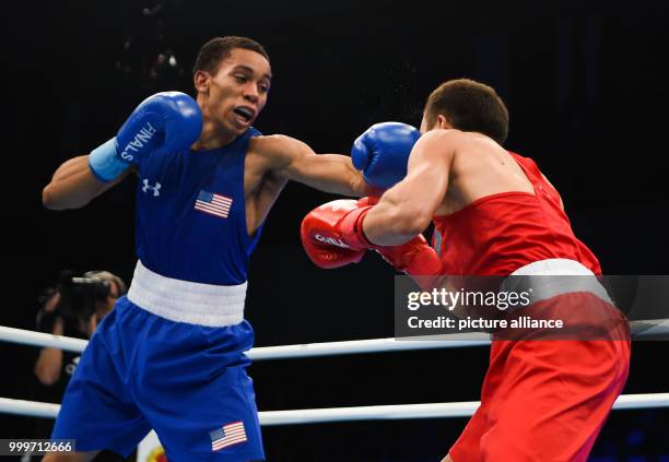 Kairat Yeraliyev of Kazakhstan fighting Duke Ragan of the USA in the bantamweight final bout of the AIBA World Boxing Championships in Hamburg,...