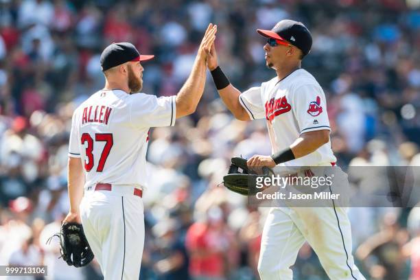 Closing pitcher Cody Allen celebrates with Michael Brantley of the Cleveland Indians after the Indians defeated the New York Yankees at Progressive...