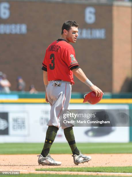 Ian Kinsler of the Los Angeles Angels of Anaheim looks on while wearing a special jersey, shoes and socks to honor Memorial Day during the game...