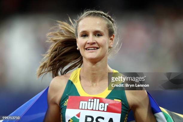 Rikenette Steenkamp of South Africa celebrates winning the Women's 100m Hurdles during day two of the Athletics World Cup London at the London...