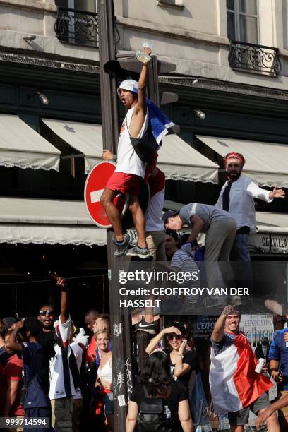 France supporters celebrate after France won the Russia 2018 World Cup final football match between France and Croatia, in the Latin Quarter in Paris...