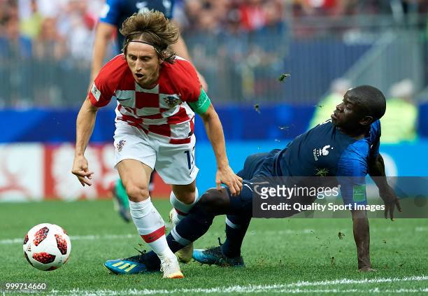 Ngolo Kante of France competes for the ball with Luka Modric of Croatia during the 2018 FIFA World Cup Russia Final between France and Croatia at...