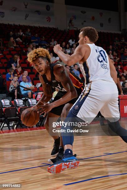 Justin Tillman of the Miami Heat handles the ball during the game against the New Orleans Pelicans during the 2018 Las Vegas Summer League on July...