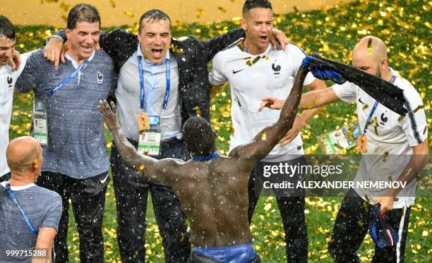 France's defender Benjamin Mendy celebrates during the trophy ceremony after winning the end of the Russia 2018 World Cup final football match...