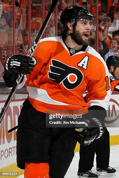 Simon Gagne of the Philadelphia Flyers celebrates after scoring a goal in the second period against the Montreal Canadiens in Game 2 of the Eastern...