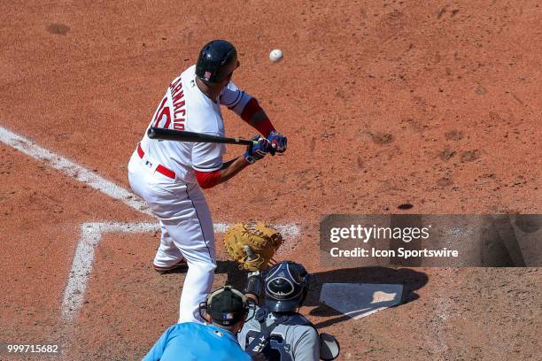 Cleveland Indians designated hitter Edwin Encarnacion is about to be hit by a pitch from New York Yankees pitcher Chad Green during the eighth inning...