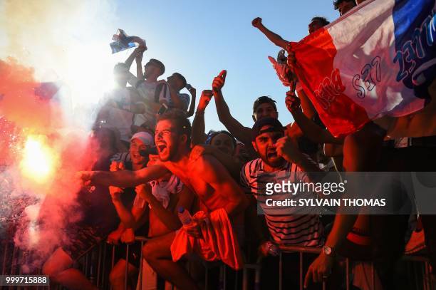 France supporters celebrate after France won the Russia 2018 World Cup final football match between France and Croatia, in Montpellier, southern...