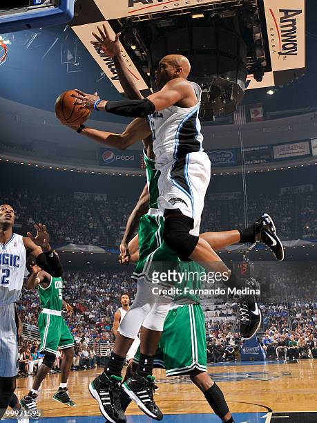 Vince Carter of the Orlando Magic shoots against Kendrick Perkins of the Boston Celtics in Game Two of the Eastern Conference Finals during the 2010...