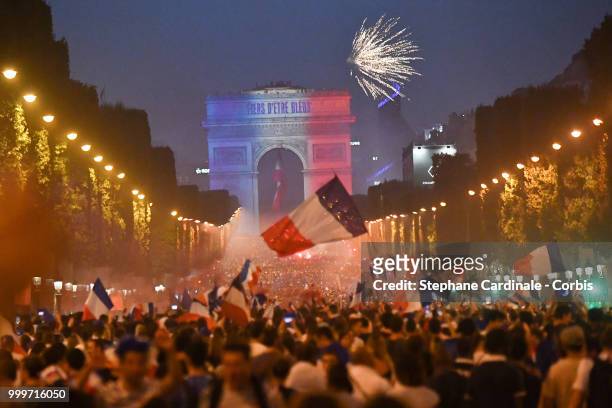 General view of the Champs Elysees with the Arc de Triomphe as the fans celebrate the Victory of France in the World Cup 2018, on July 15, 2018 in...