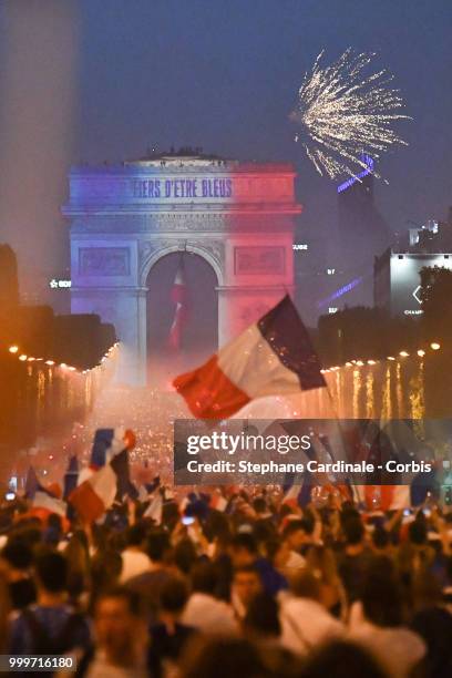 General view of the Champs Elysees with the Arc de Triomphe as the fans celebrate the Victory of France in the World Cup 2018, on July 15, 2018 in...