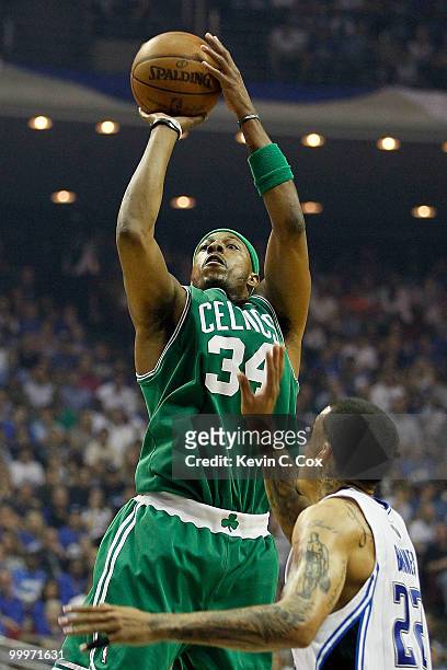 Paul Pierce of the Boston Celtics attempts a shot in the first quarter against Matt Barnes of the Orlando Magic in Game Two of the Eastern Conference...