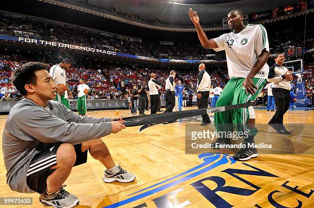 Kendrick Perkins of the Boston Celtics stretches before Game Two of the Eastern Conference Finals against the Orlando Magic during the 2010 NBA...
