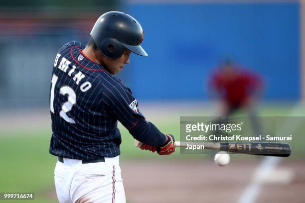 Takashi Umino of Japan hits the ball in the sixth inning during the Haarlem Baseball Week game between Cuba and Japan at Pim Mulier Stadion on July...
