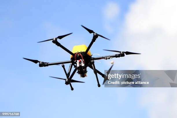 Multi-copter drone can be seen participating in the "Dronemasters Dronathon" in Berlin, Germany, 3 September 2017. Photo: Maurizio Gambarini/dpa