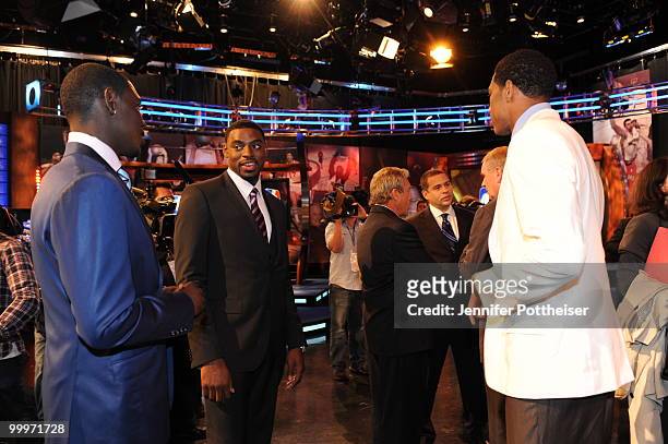 Tyreke Evans of the Sacramento Kings talks to Jrue Holiday of the Philadelphia 76ers priot to the 2010 NBA Draft Lottery at the Studios at NBA...
