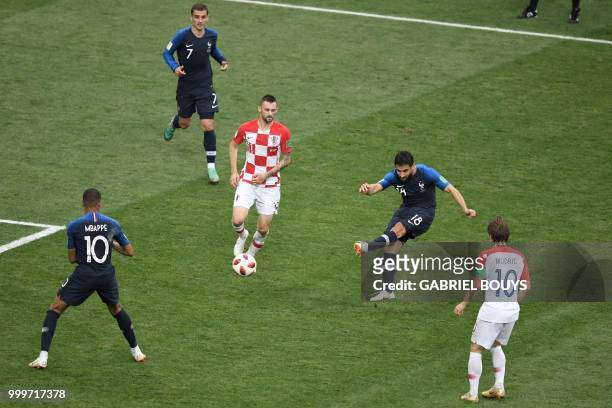France's midfielder Nabil Fekir kicks the ball during the Russia 2018 World Cup final football match between France and Croatia at the Luzhniki...