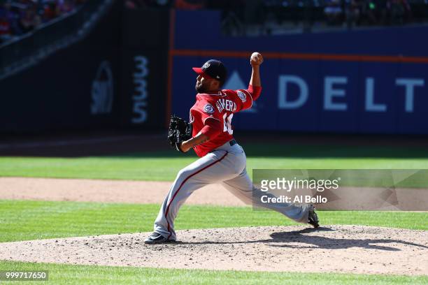 Kelvin Herrera of the Washington Nationals pitches against the New York Mets in the ninth inning during their game at Citi Field on July 15, 2018 in...
