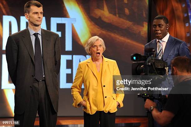 New Jersey Nets owner Mikhail Prokhorov, Irene Pollin, owner of the Washington Wizards and Jrue Holiday of the Philadelphia 76ers reacts during the...