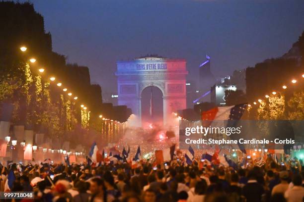 General view of the Champs Elysees with the Arc de Triomphe as the fans celebrate the Victory of France in the World Cup 2018, on July 15, 2018 in...