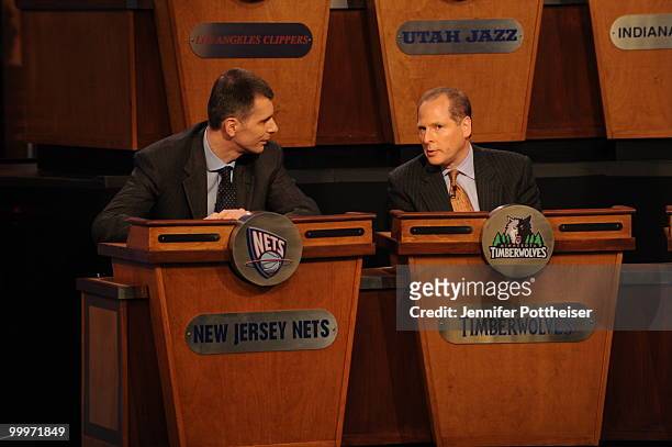 New Jersey Nets owner Mikhail Prokhorov speaks to David Kahn, president of the Minnesota Timberwolves during the 2010 NBA Draft Lottery at the...