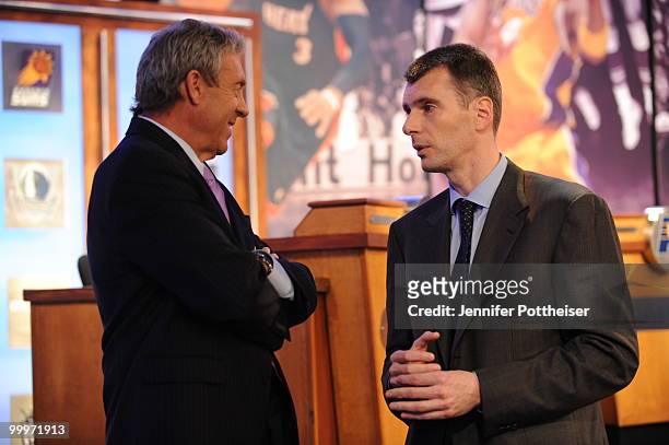 General Manager Larry Riley of the Minnesota Timberwolves speaks to New Jersey Nets owner Mikhail Prokhorov during the 2010 NBA Draft Lottery at the...